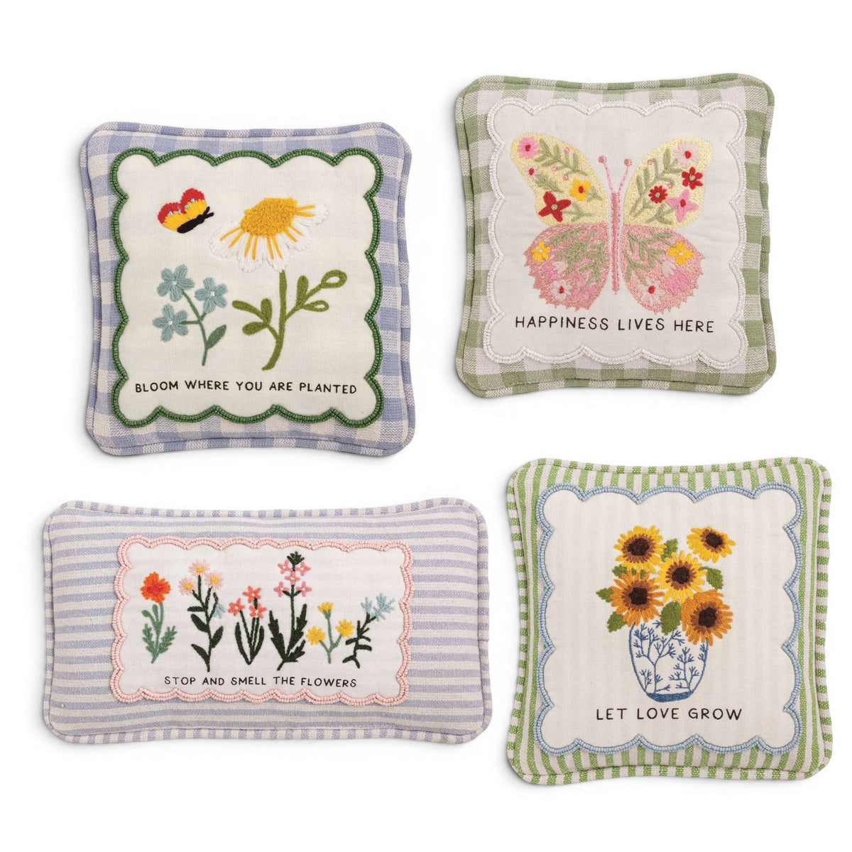 Set of four embroidered mini accent pillows with floral embroidery and motivational words