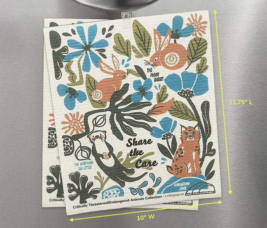 Wildlife Swedish dishcloth with colorful animals and blue flower print, packaged set