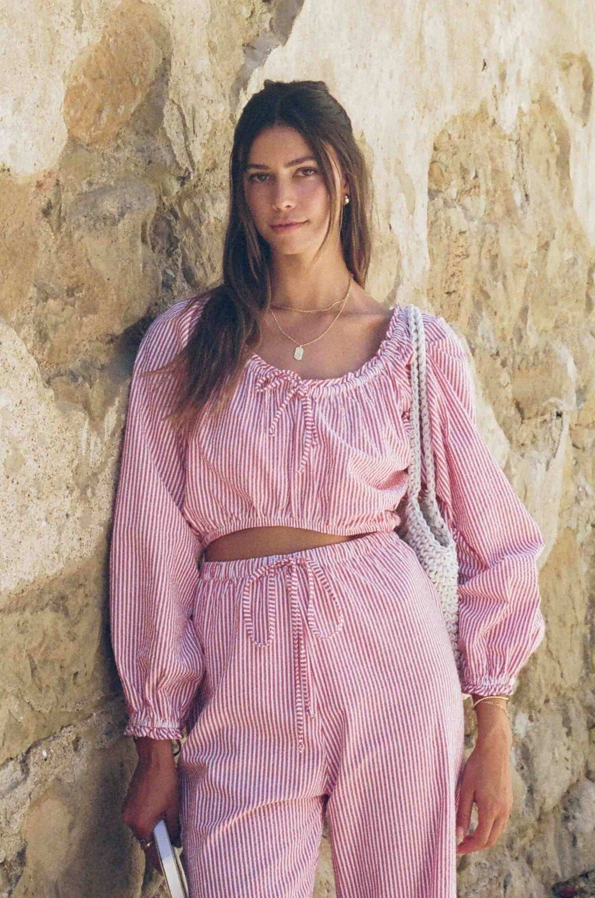 Red-and-white striped seersucker off-shoulder peasant top with long puff sleeves