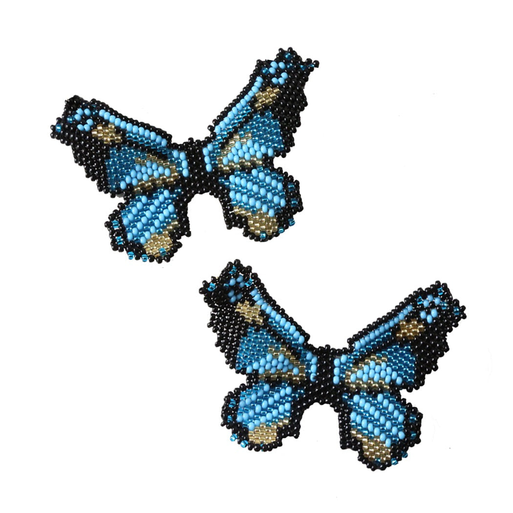 Butterfly-shaped beaded earrings in blue with black and gold accents