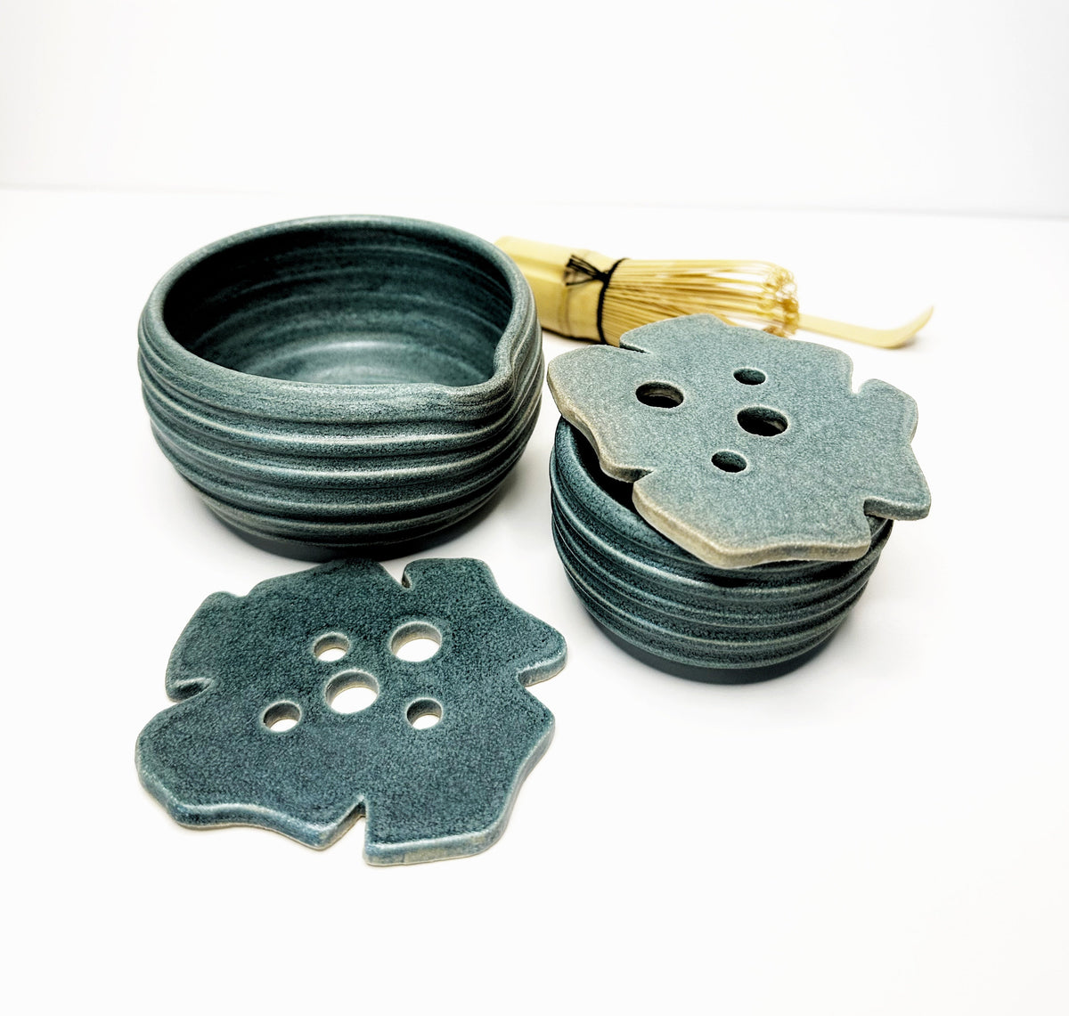Forest green matcha bowl set with whisk and leaf-shaped mini bowl, stacked bowls