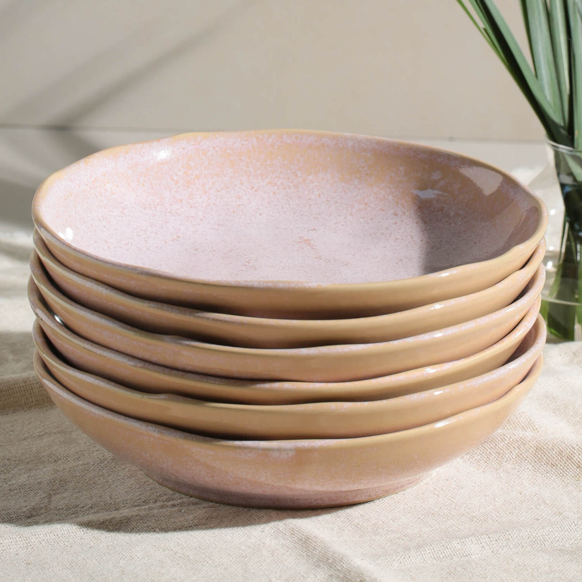 Pink speckled ceramic pasta bowls, stack of 6 plates