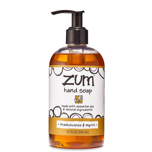 Zum hand soap bottle with amber pump and clear bottle filled with amber liquid