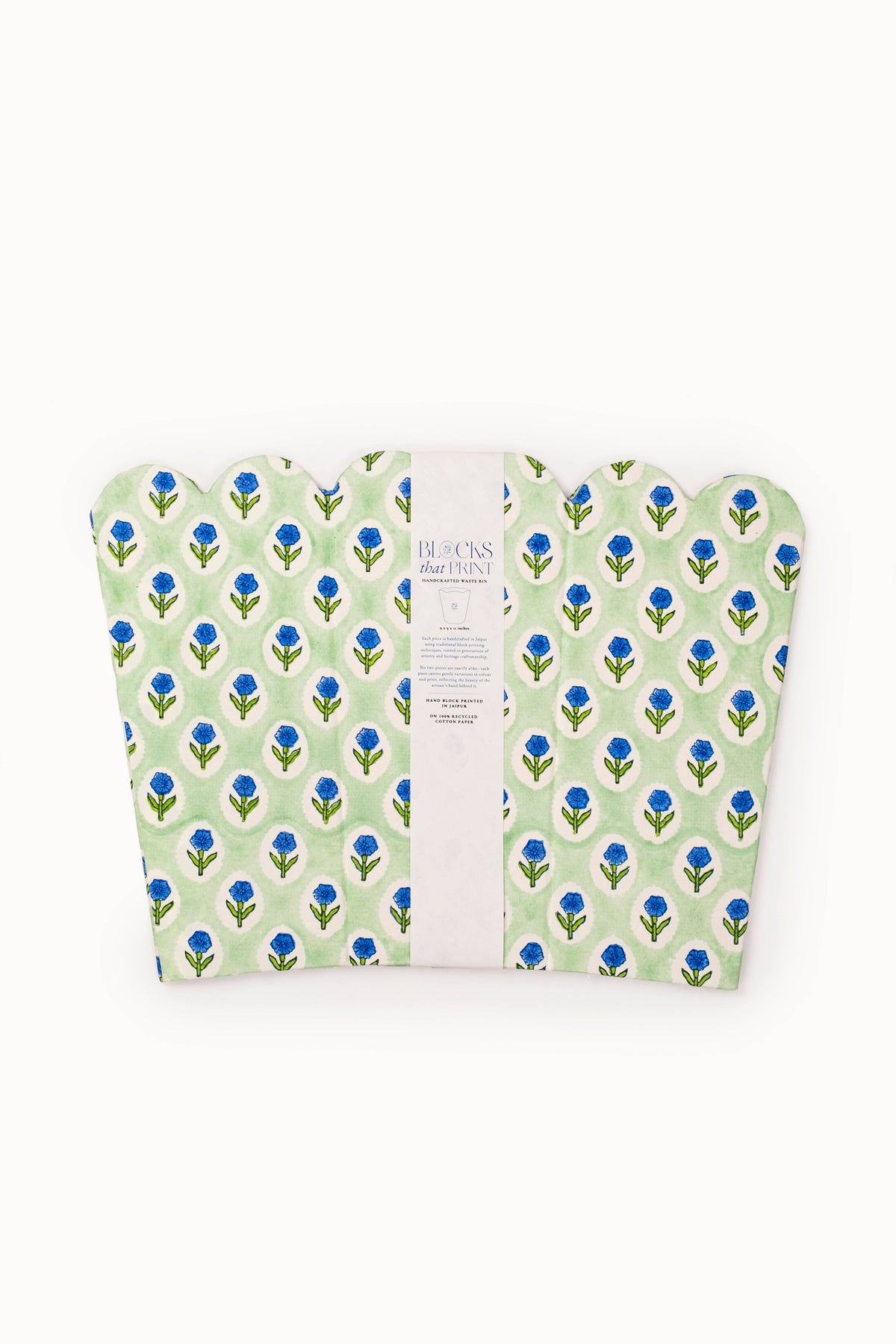 Collapsible block-print storage basket, mint with blue leaf pattern and center label