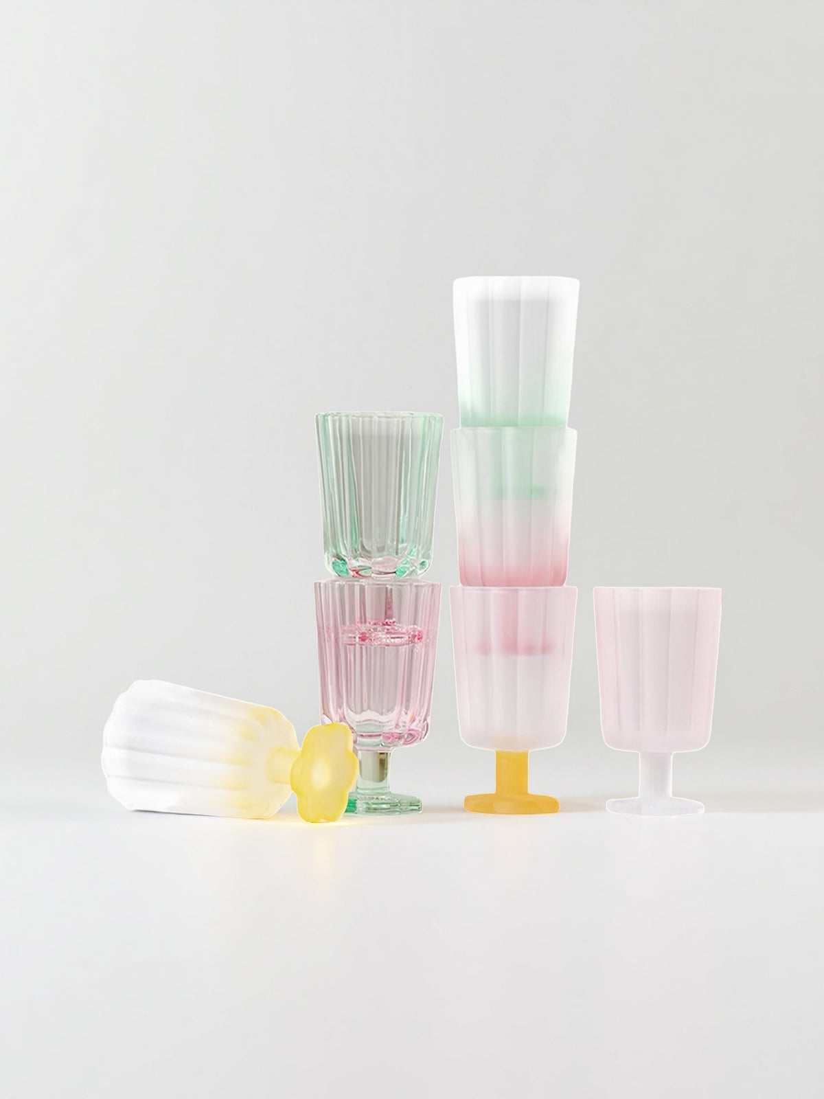 Assorted pastel hand-blown petal goblets with rounded flared bases
