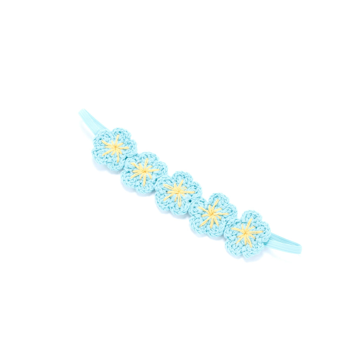 Blue knit flower crown headband with yellow centers and elastic ends