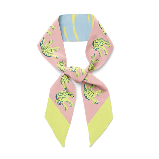 Pastel ribbon scarf with cartoon tigers and yellow blue stripe blocks, tied in a bow