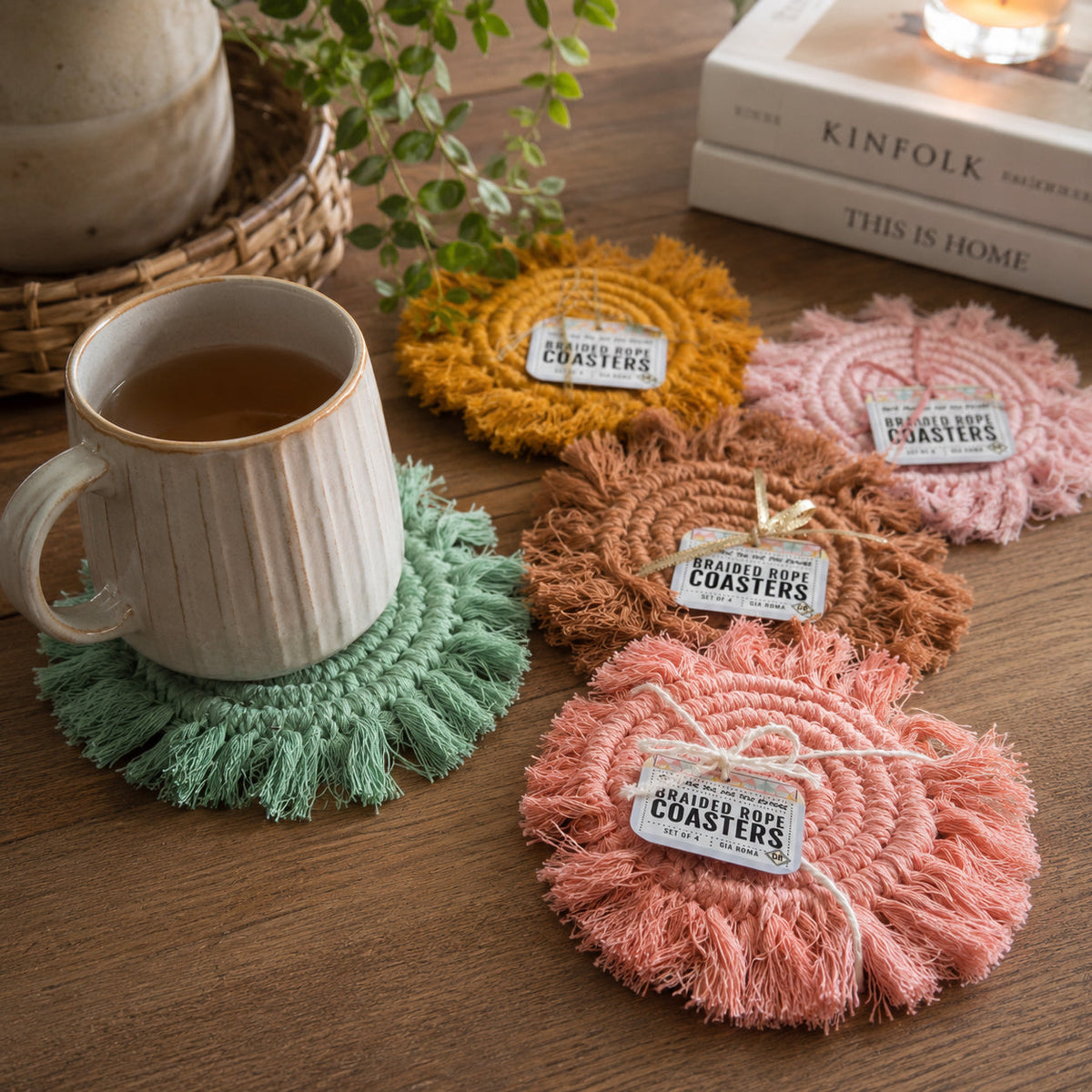 Braided rope tassel coasters set in brown, pink, and green with circular woven centers