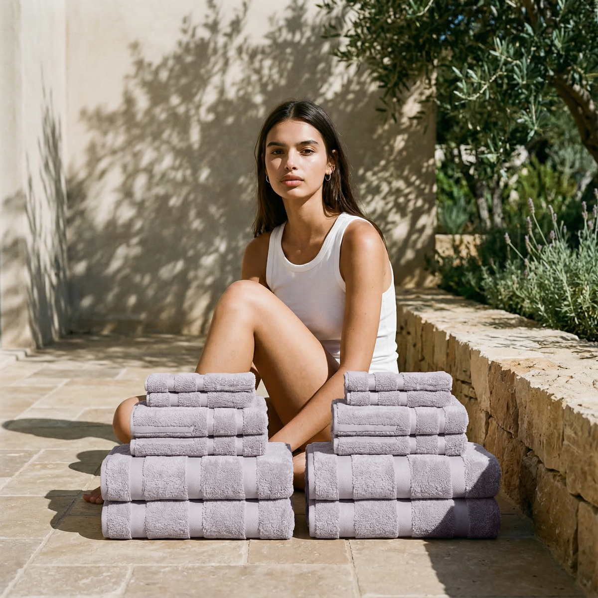 Australian cotton towels in lilac, stacked and folded