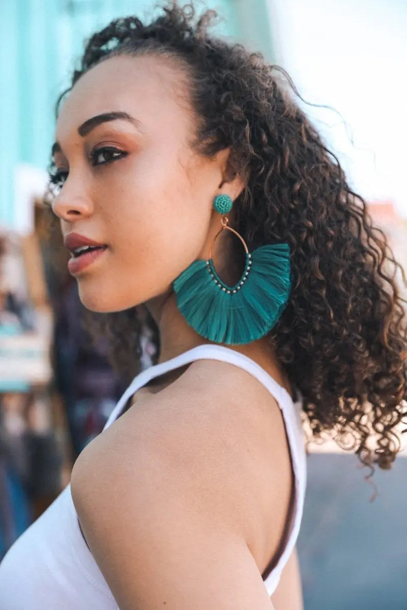 Teal fan tassel drop earrings with layered fringe and small top bead