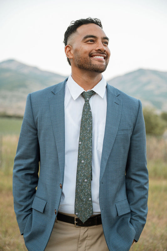 Men's tie, dark green floral pattern with subtle speckled texture