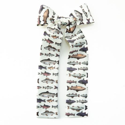 Lady hair bow with white fabric and multicolor fish print
