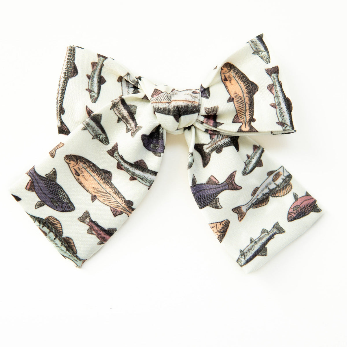 Petite hair bow with cream base and colorful fish print, layered ribbon bow