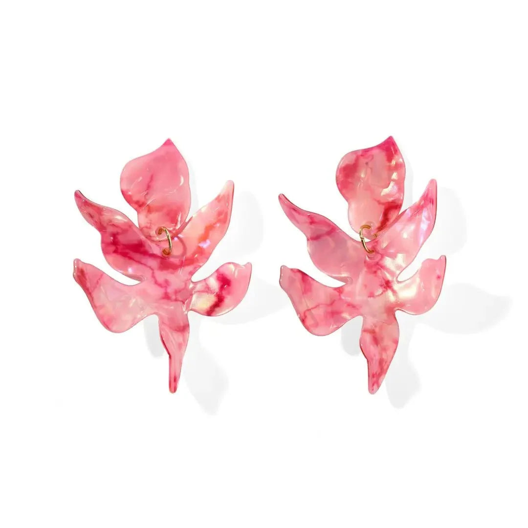 Pink floral statement earrings with layered petal-like shapes and gold hoop hardware