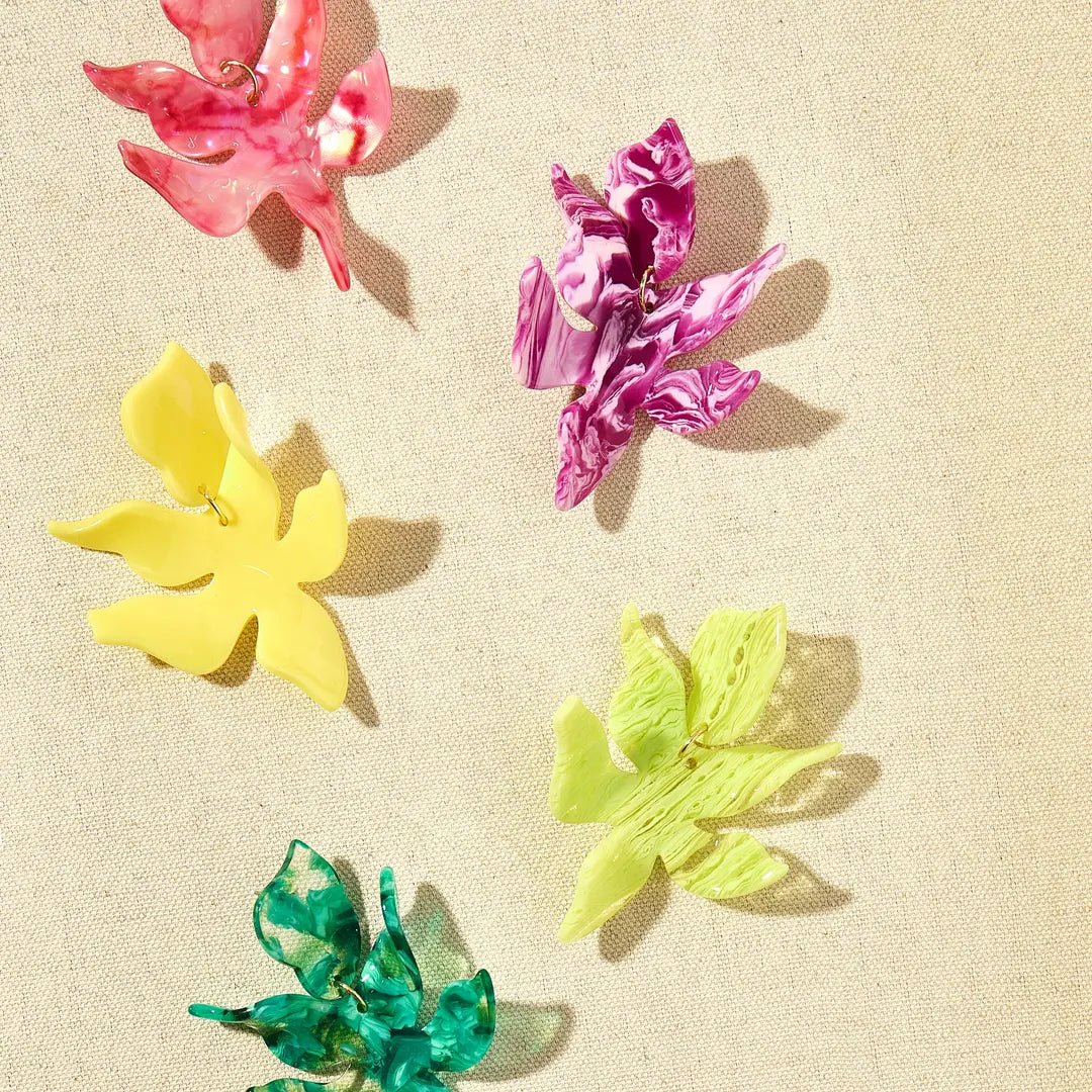 Set of colorful flower earrings shown together: pink, purple, lime green, and teal