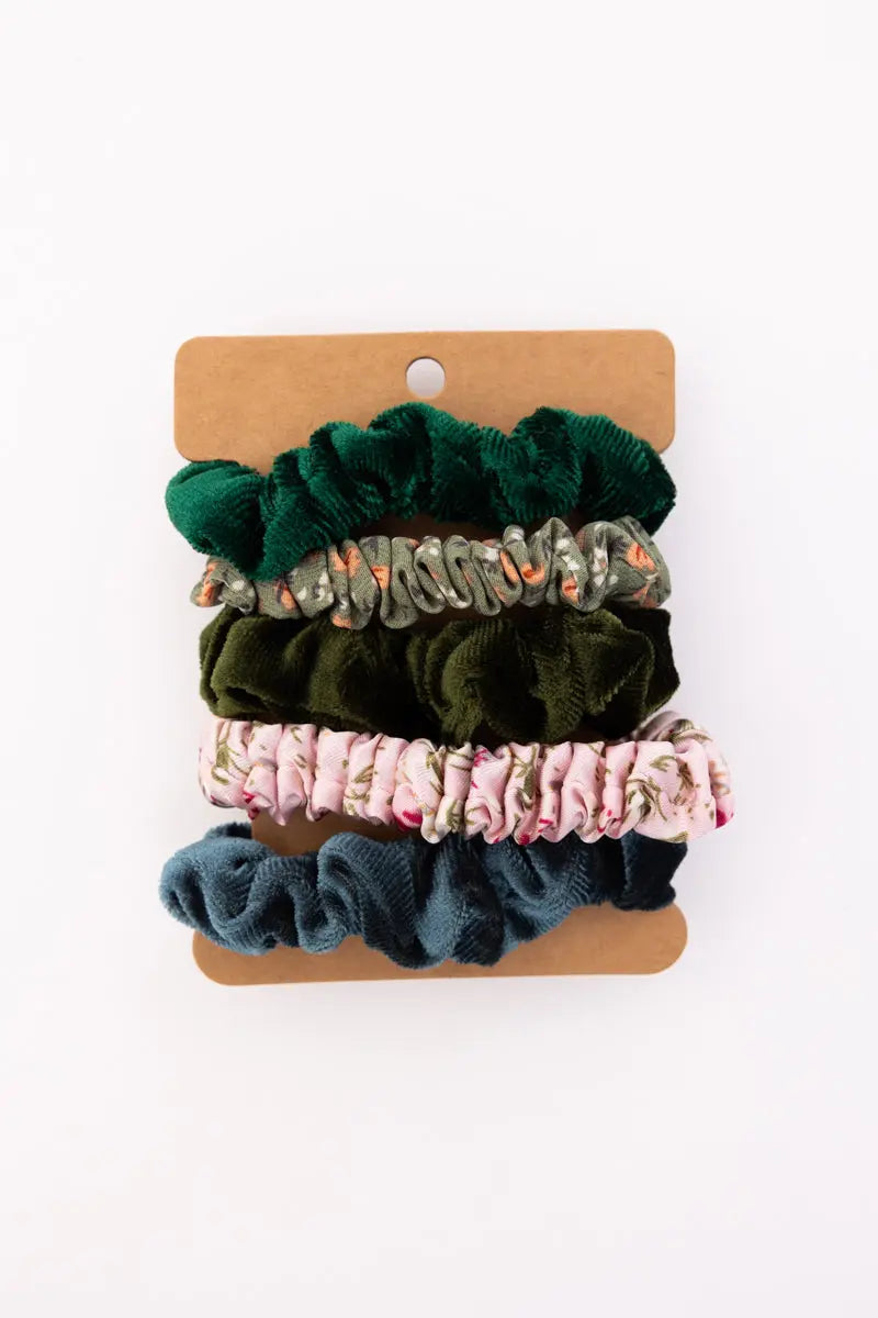 Assorted autumn floral hair scrunchies on card: dark green, olive, pink, and charcoal