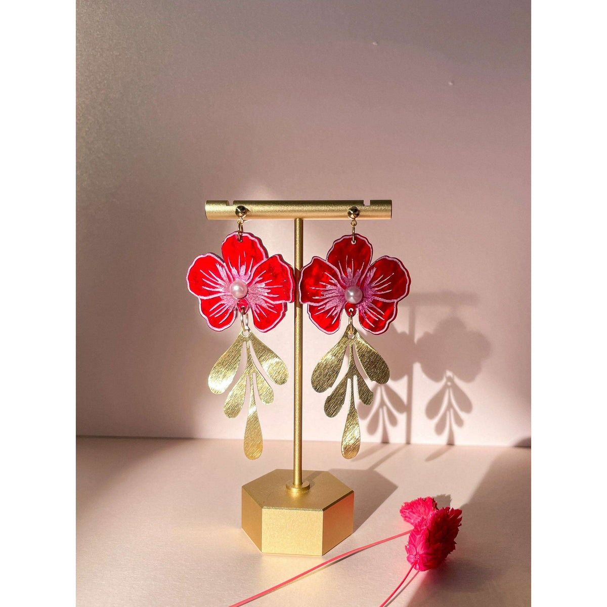 Gold-tone hook acrylic flower earrings, red petals with pearl centers and gold leaves