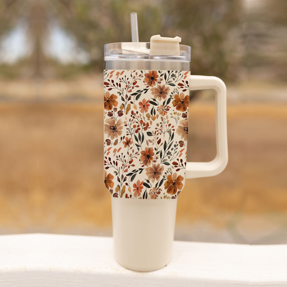 40oz floral insulated tumbler with handle, clear lid, and straw, front view