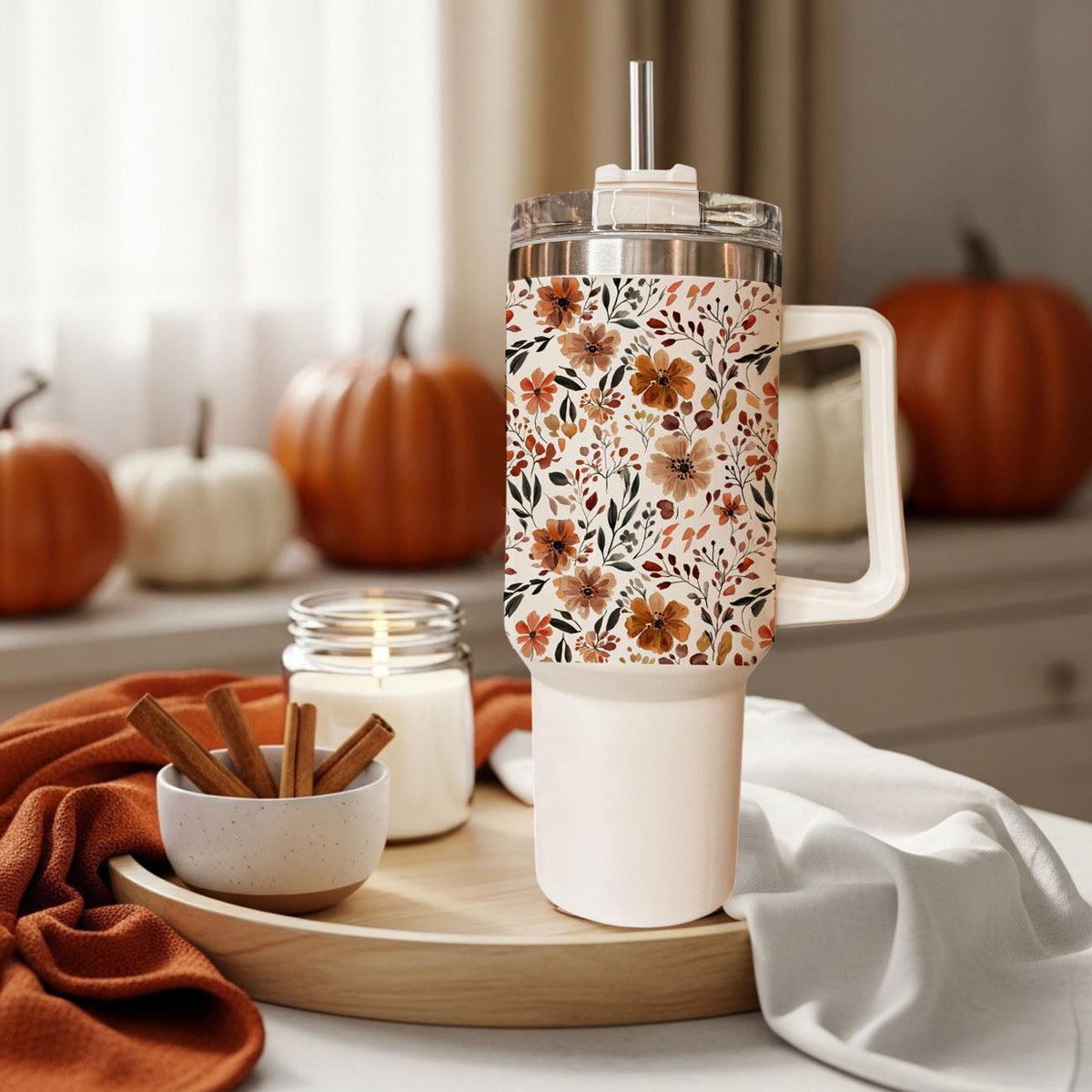 Floral 40oz tumbler with floral autumn print, clear lid, straw, and white handle