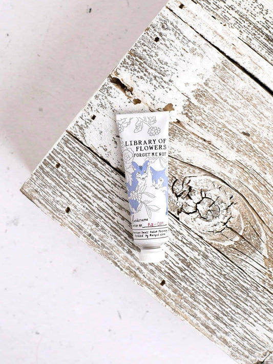 Forget Me Not hand cream tube, white with blue floral label