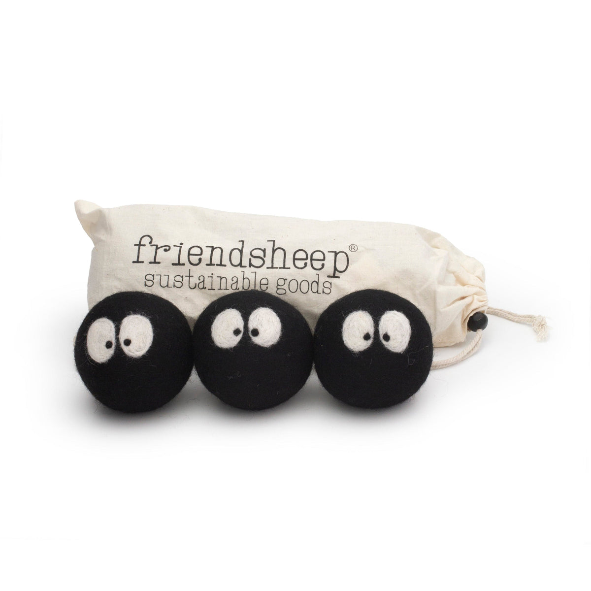 Set of three black plush laundry scent balls with cute white eyes and faces
