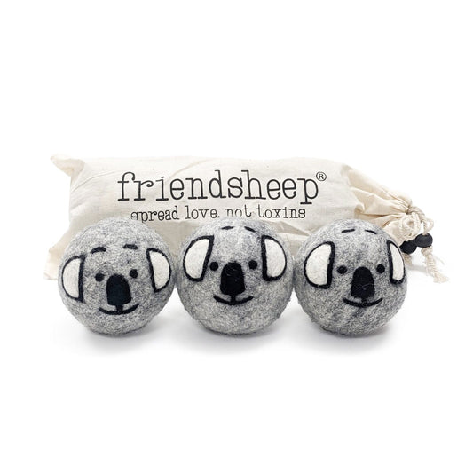 Three gray koala plush toys with embroidered faces in a soft fabric pouch