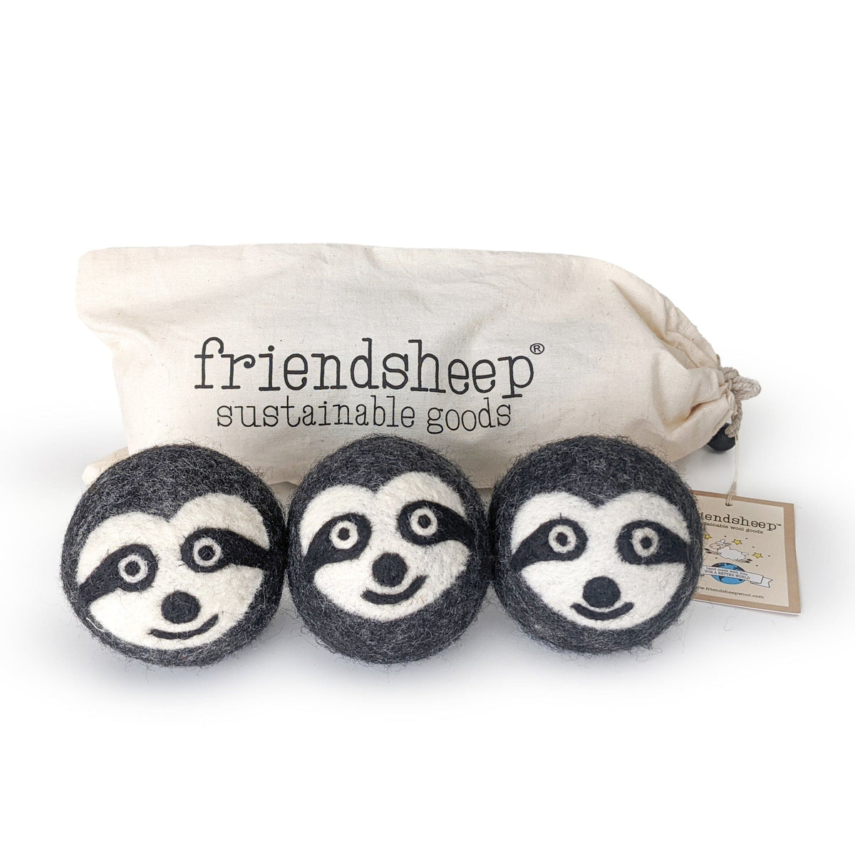 Three felt sloth plush toys with embroidered faces in a cream fabric pouch