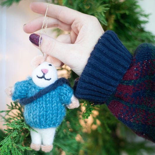 Mouse eco ornament with blue knit sweater held by hand, yarn loop for hanging.