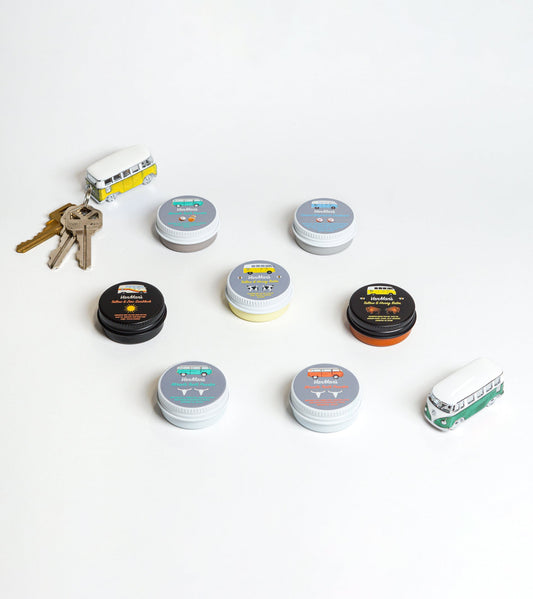 VanMan Tiny's balm and deodorant tins set, assorted lids and sizes on white background