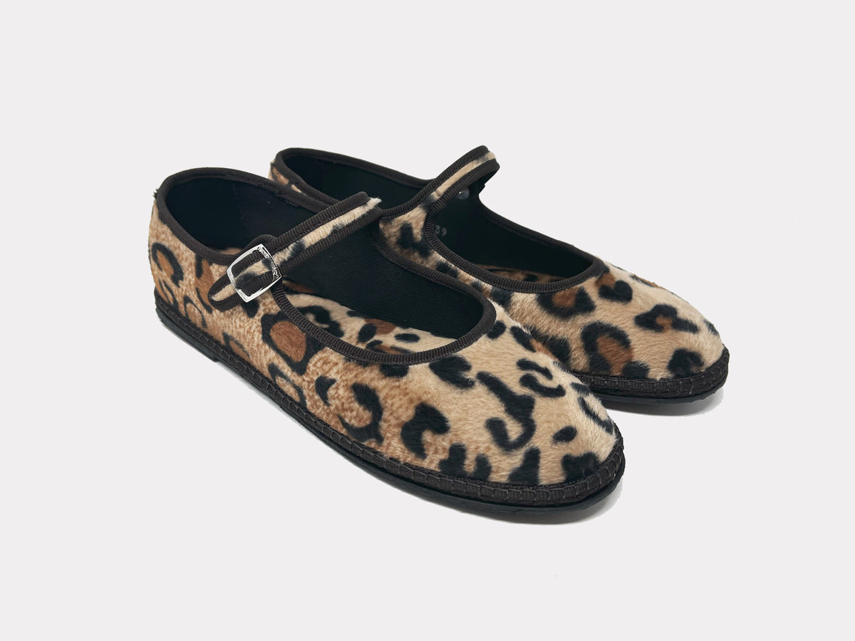 Leopard print Mary Jane flats with silver buckled strap and black sole