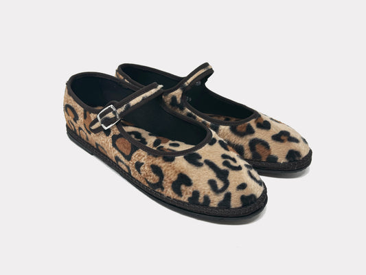 Leopard print Mary Jane flats with silver buckled strap and black sole