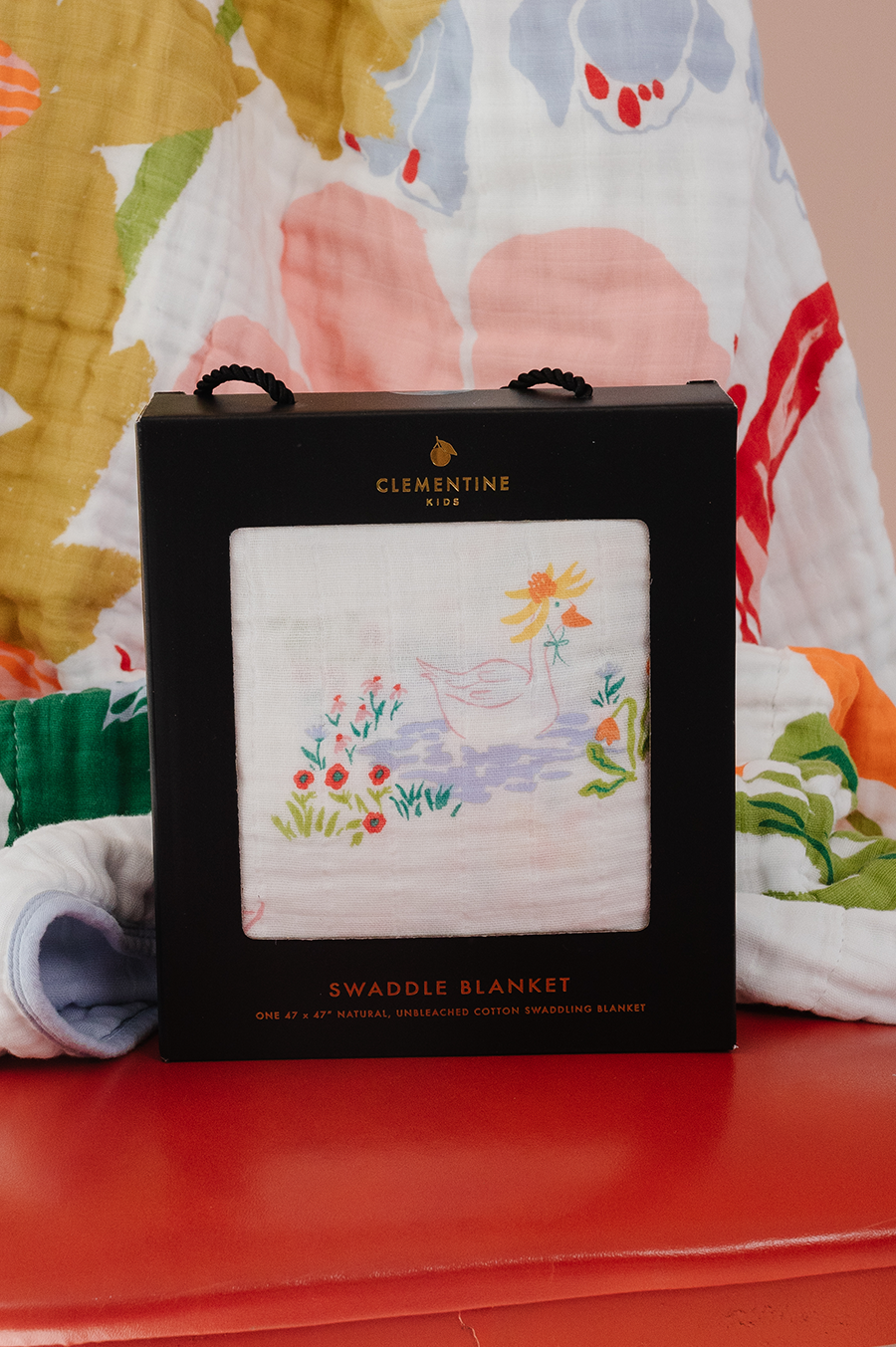 Clementine swaddle blanket gift box, black box with colorful garden goose design