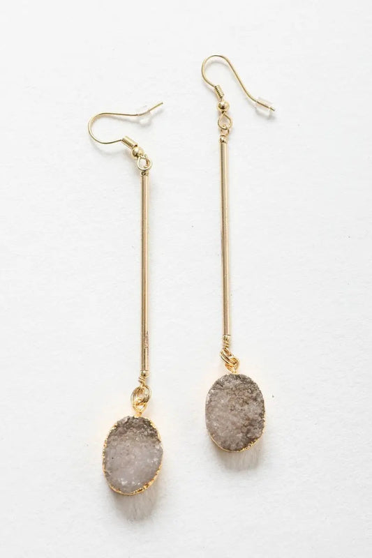 Gold-tone gemstone drop earrings with oval gray stones on long vertical bars