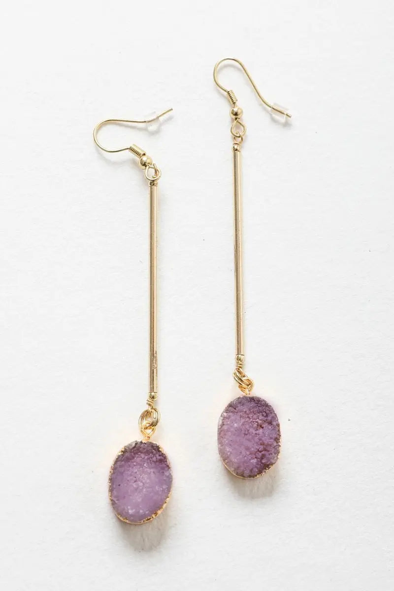 Gold-tone gemstone drop earrings with oval lavender stones on gold lever hooks