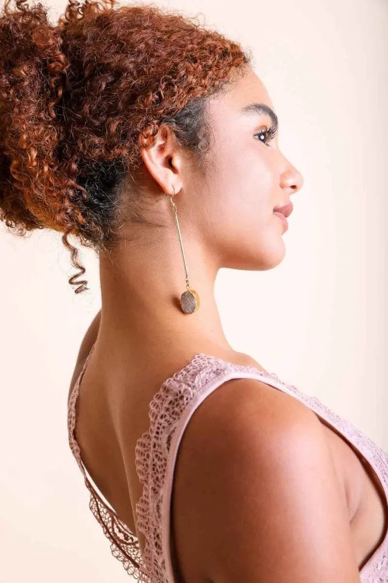 Gold-tone gemstone drop earrings with round gray stone drop