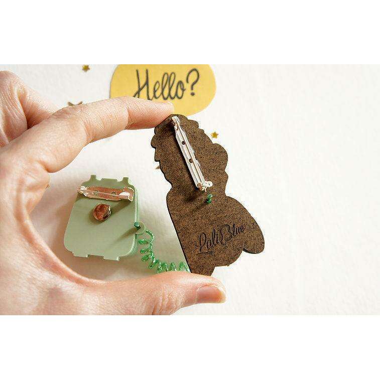 Back of girl phone collar clip brooch with clasp pin and "Hello?" charm