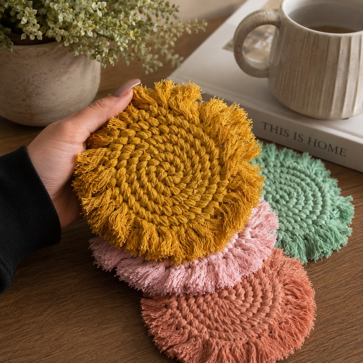 Braided rope round coasters in mustard, mint green, coral pink, and rose tones