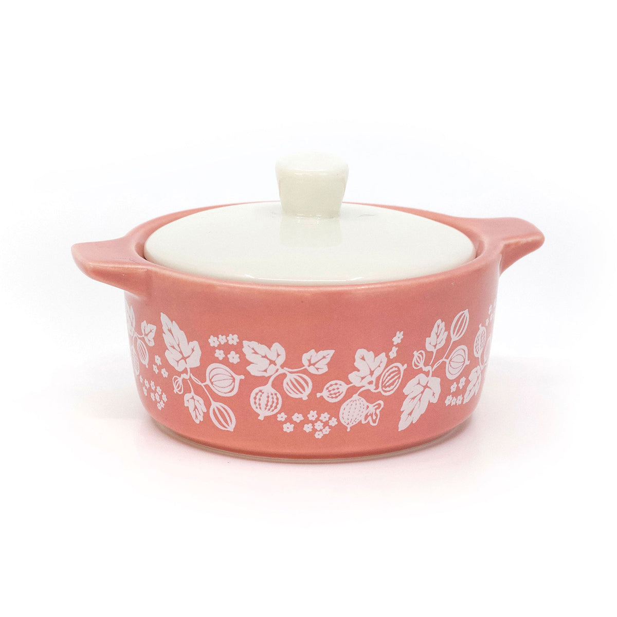 Pink ceramic casserole trinket box with white lid and floral pattern, full view
