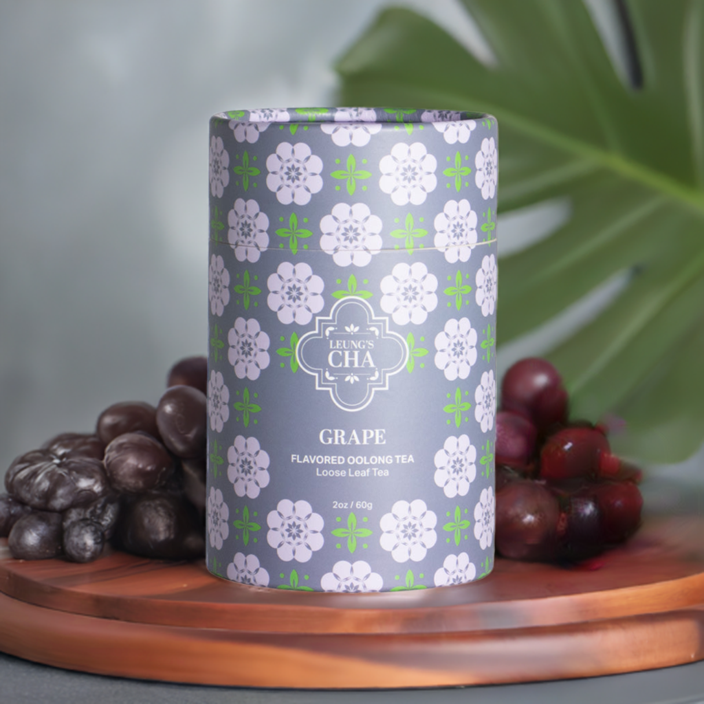 Flavored oolong tea canister in purple with grape floral pattern and label, upright view