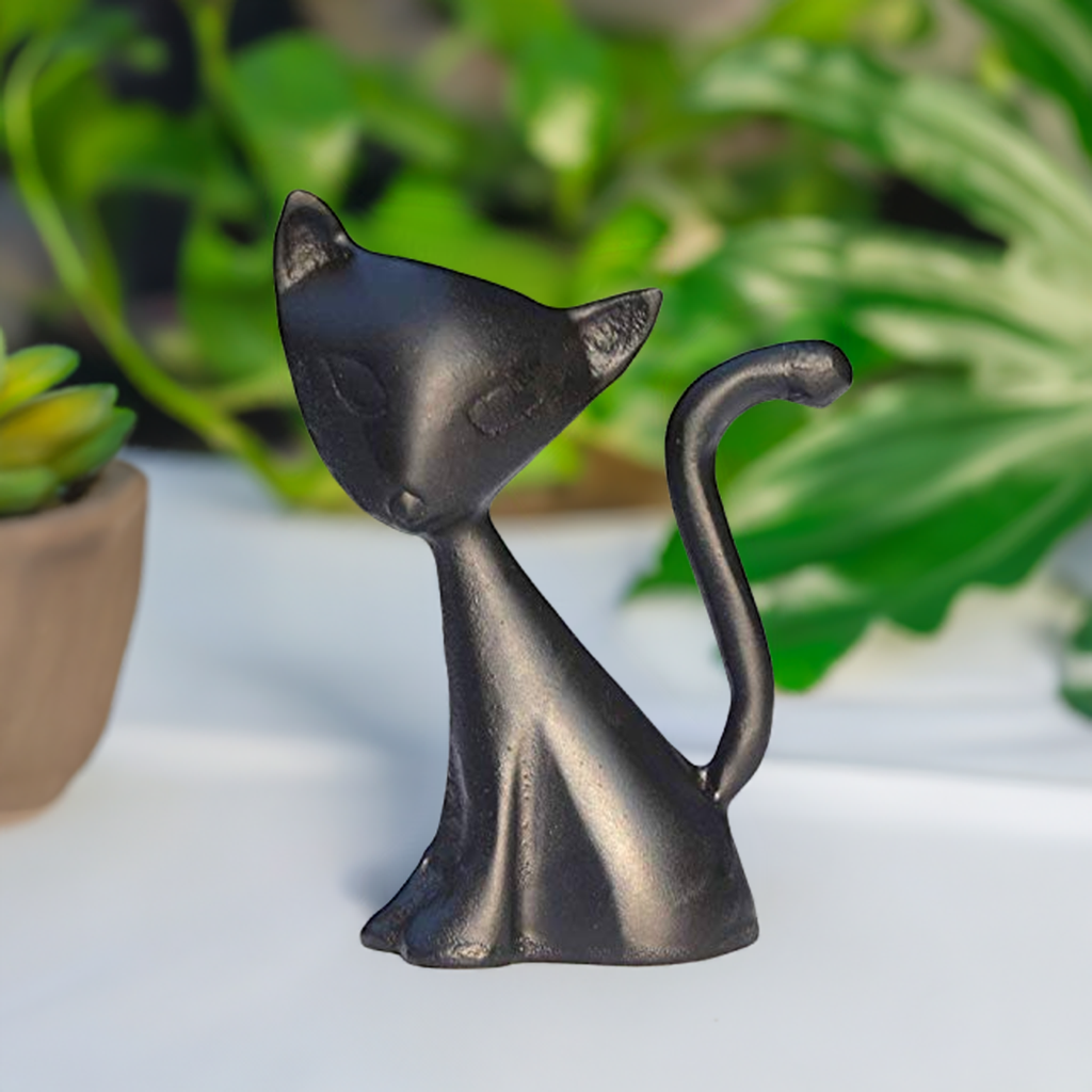 Black cat ring holder statue with curled tail and facial features, designed to hold rings.