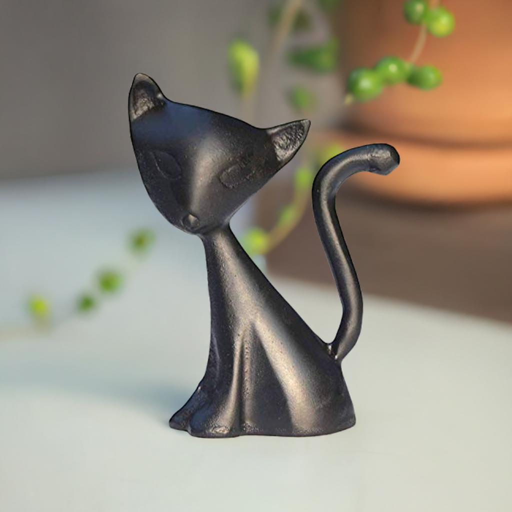 Black cat ring holder figurine with curled tail and smooth standing pose for rings.