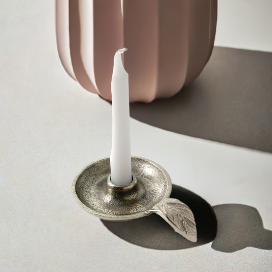 Silver aluminum taper candlestick holder with leaf-shaped handle base, for white candles