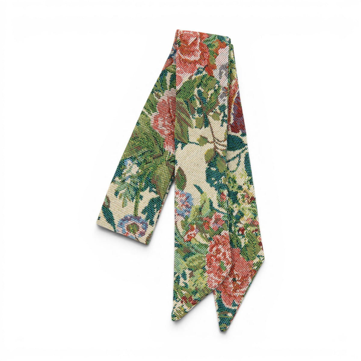 Hair sash with multicolor floral patchwork pattern, folded ribbon for tying.