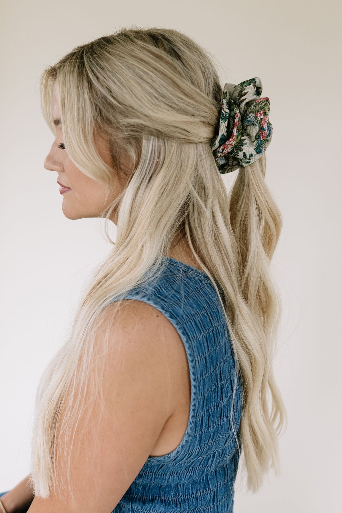 Multicolor plaid hair scrunchie on blonde ponytail