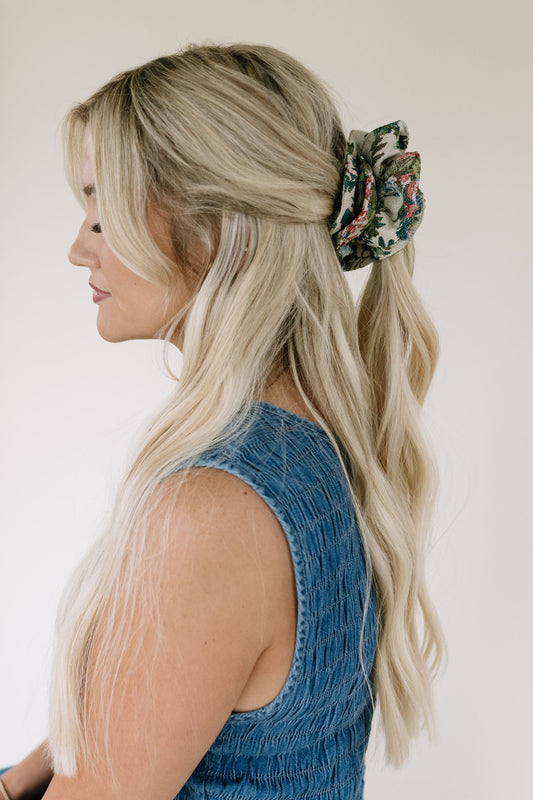 Multicolor plaid hair scrunchie on blonde ponytail