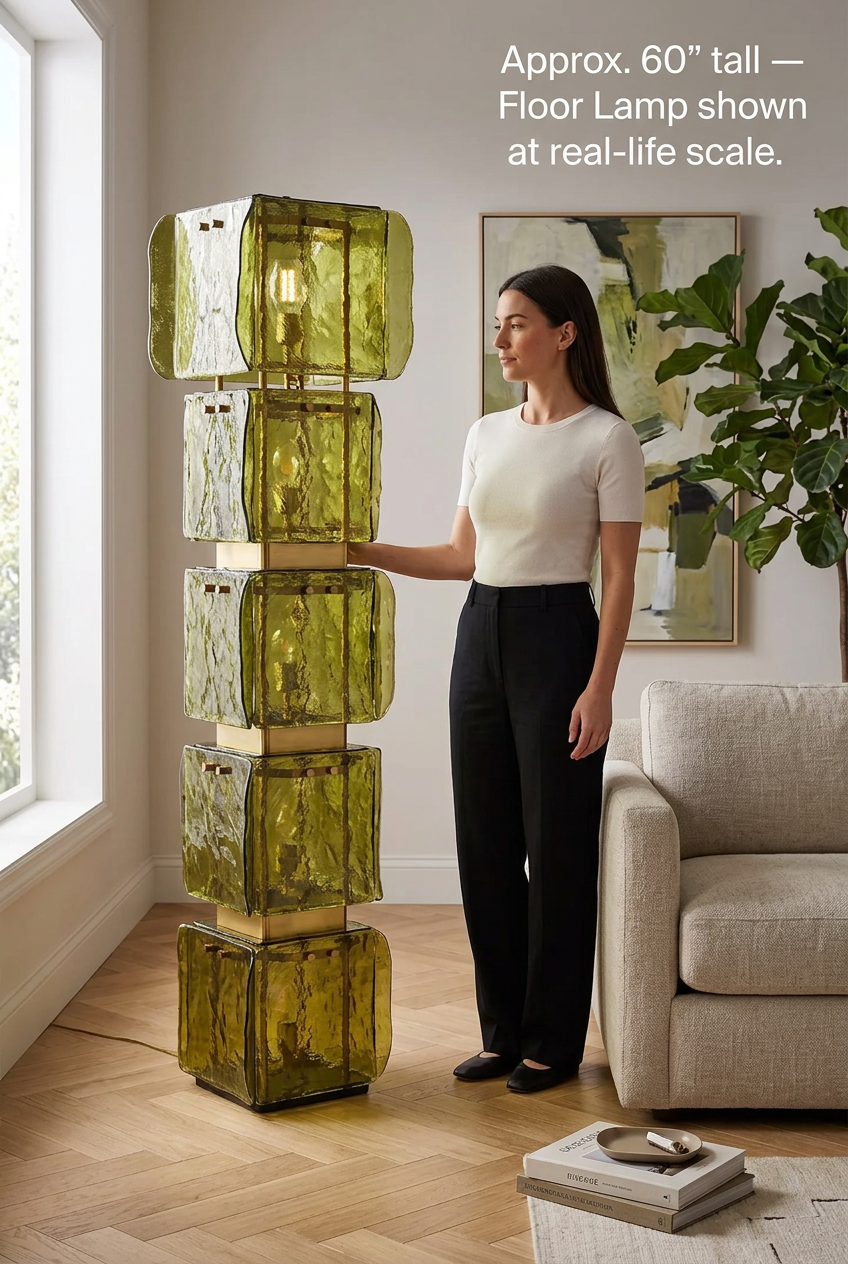 Green glass floor lamp shown beside a person for scale