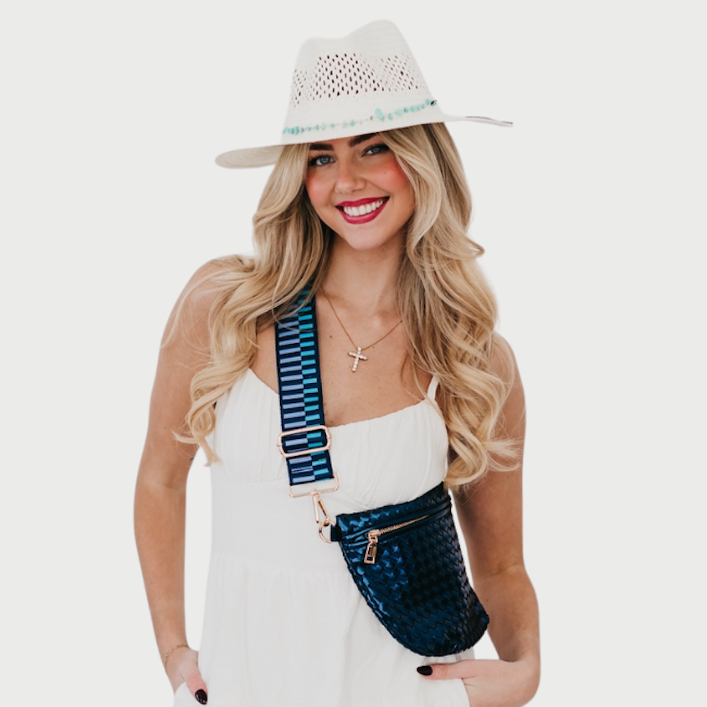 White perforated western sun hat with turquoise beaded trim, wide brim.