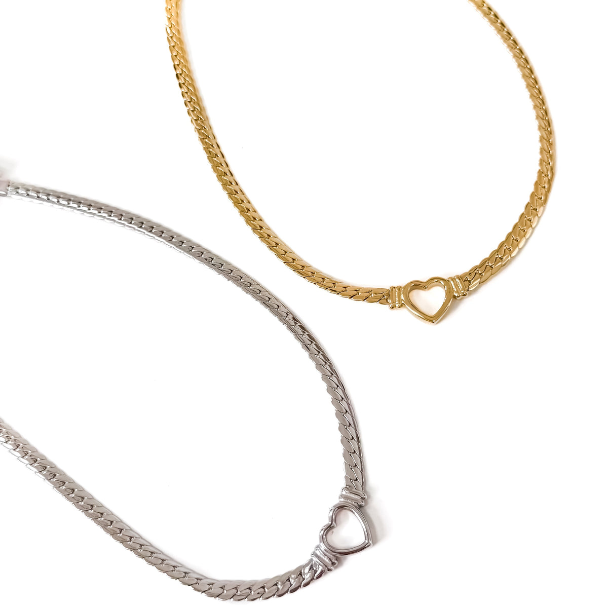Gold- and silver-tone heart pendant necklaces with curb chain and heart links