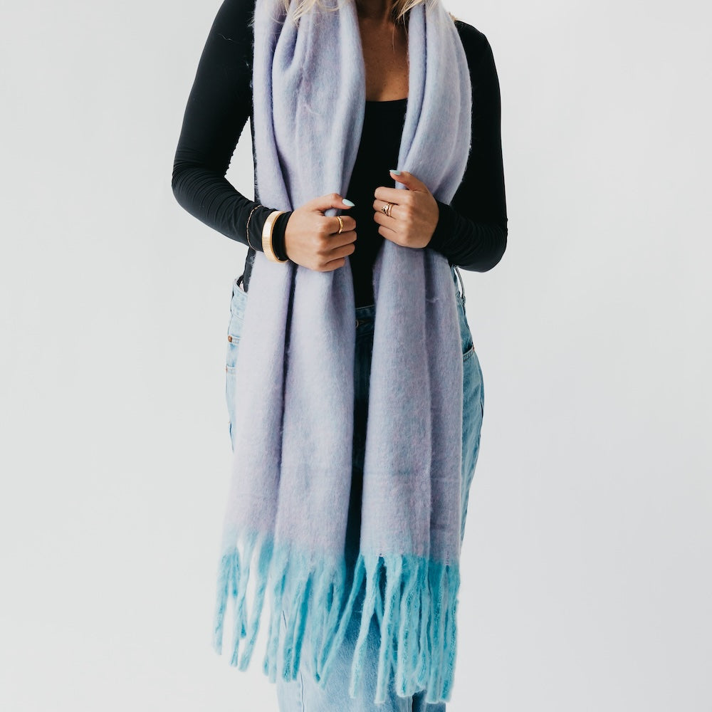 Lavender blanket scarf with tasseled hem, wrapped at the neck