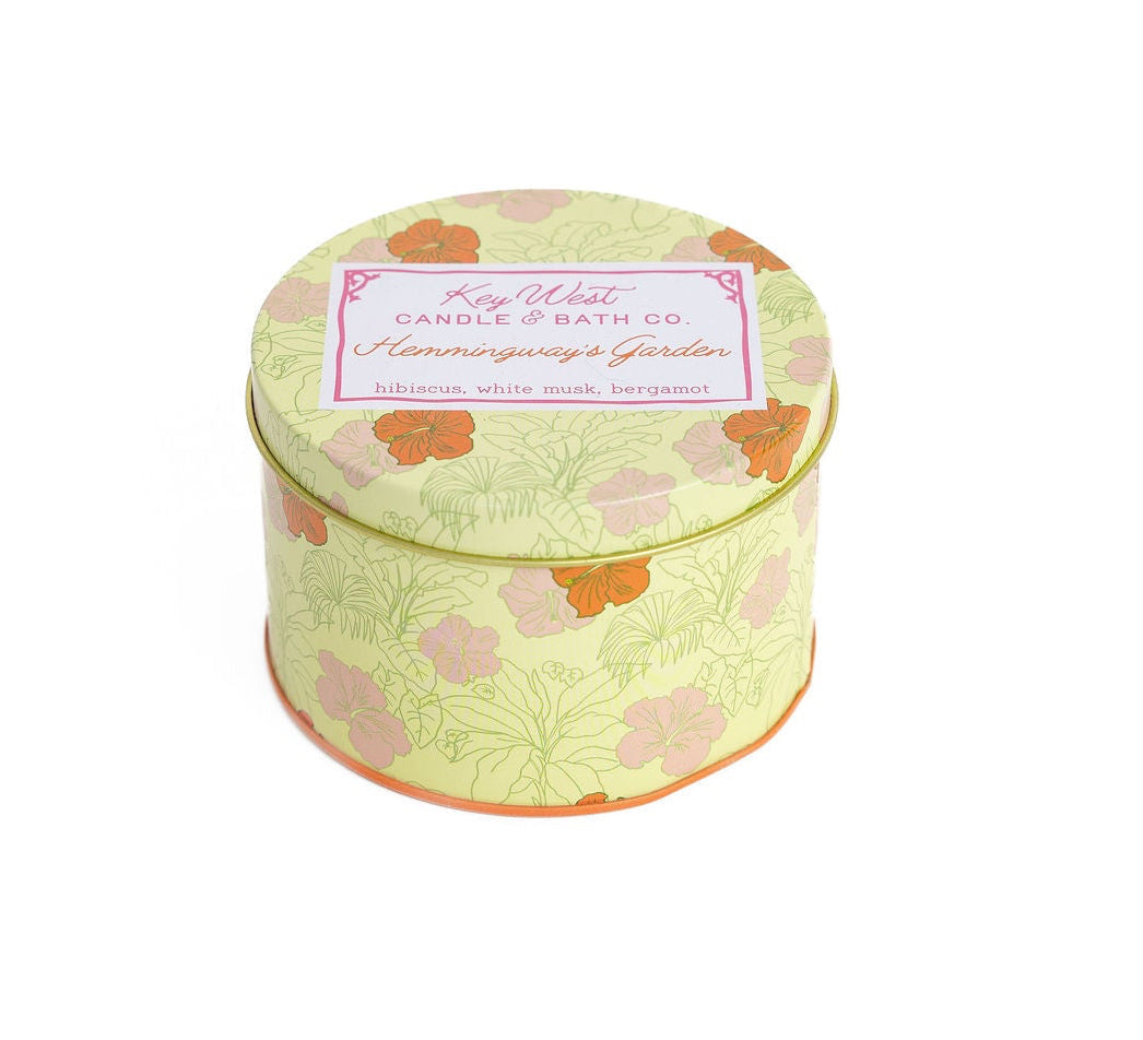 Floral patterned travel candle tin with lid label, round metal container